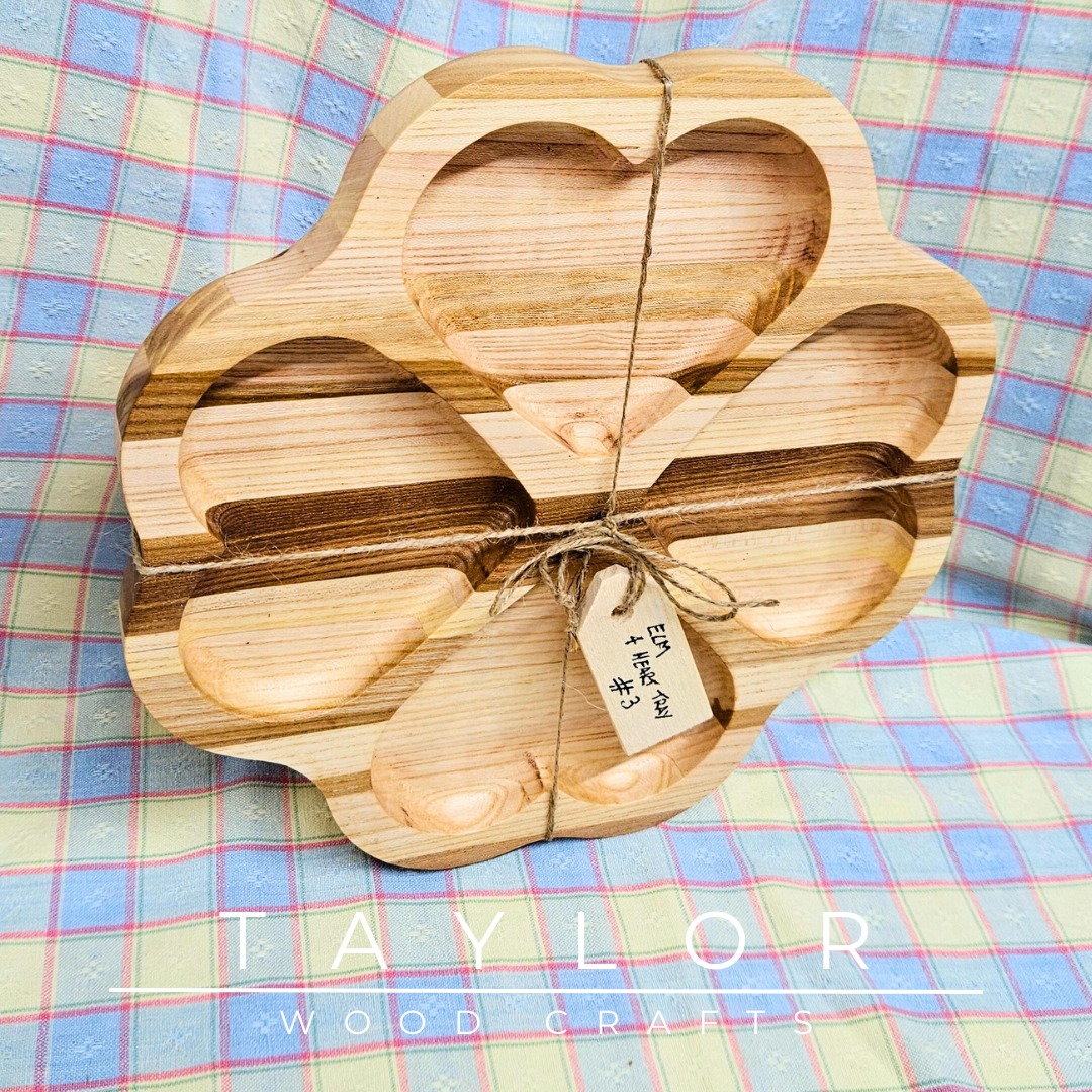 Discover our handcrafted elm wood serving tray, featuring a distinctive four-heart design. Perfect for serving treats, displaying decor, or as a thoughtful gift.