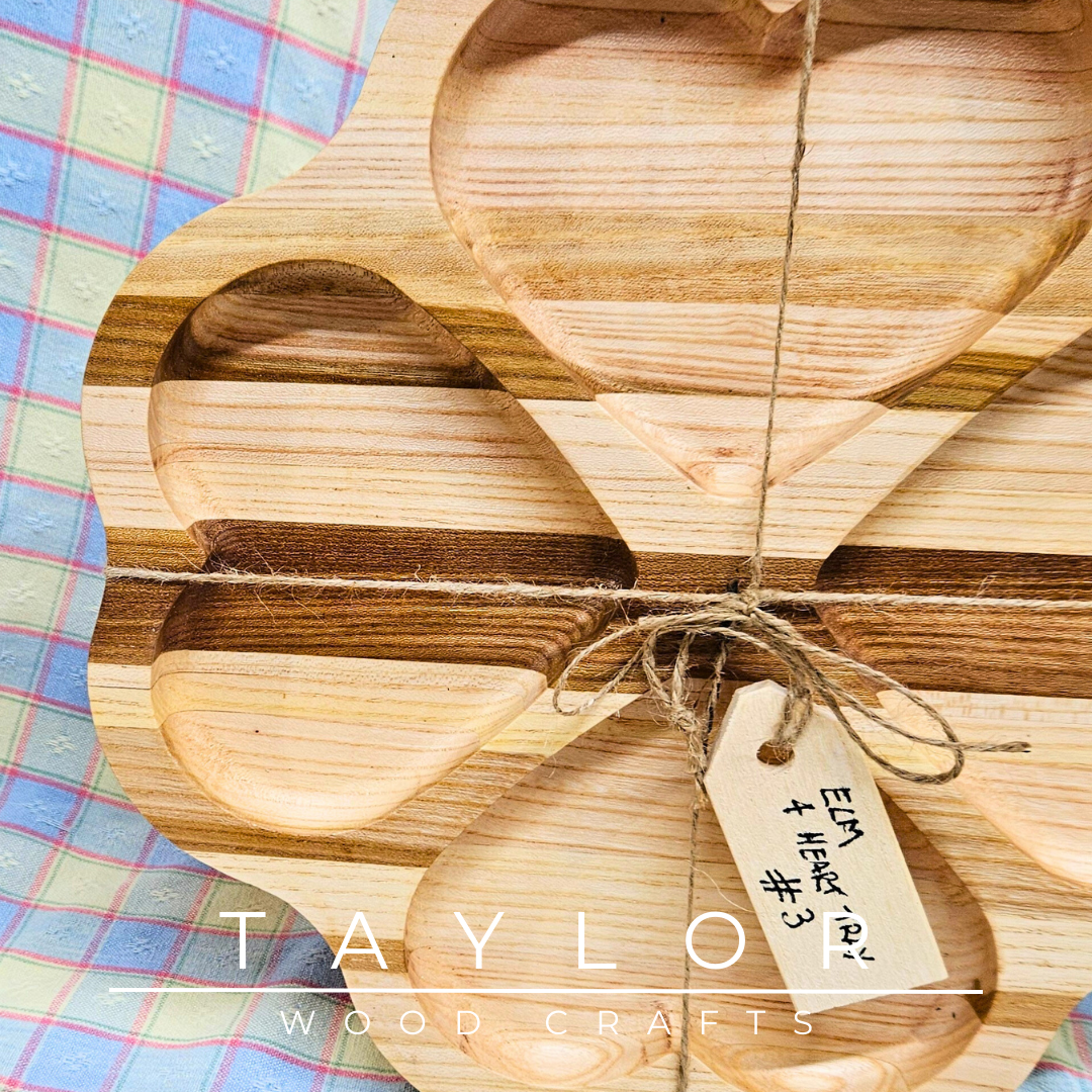 Discover our handcrafted elm wood serving tray, featuring a distinctive four-heart design. Perfect for serving treats, displaying decor, or as a thoughtful gift.