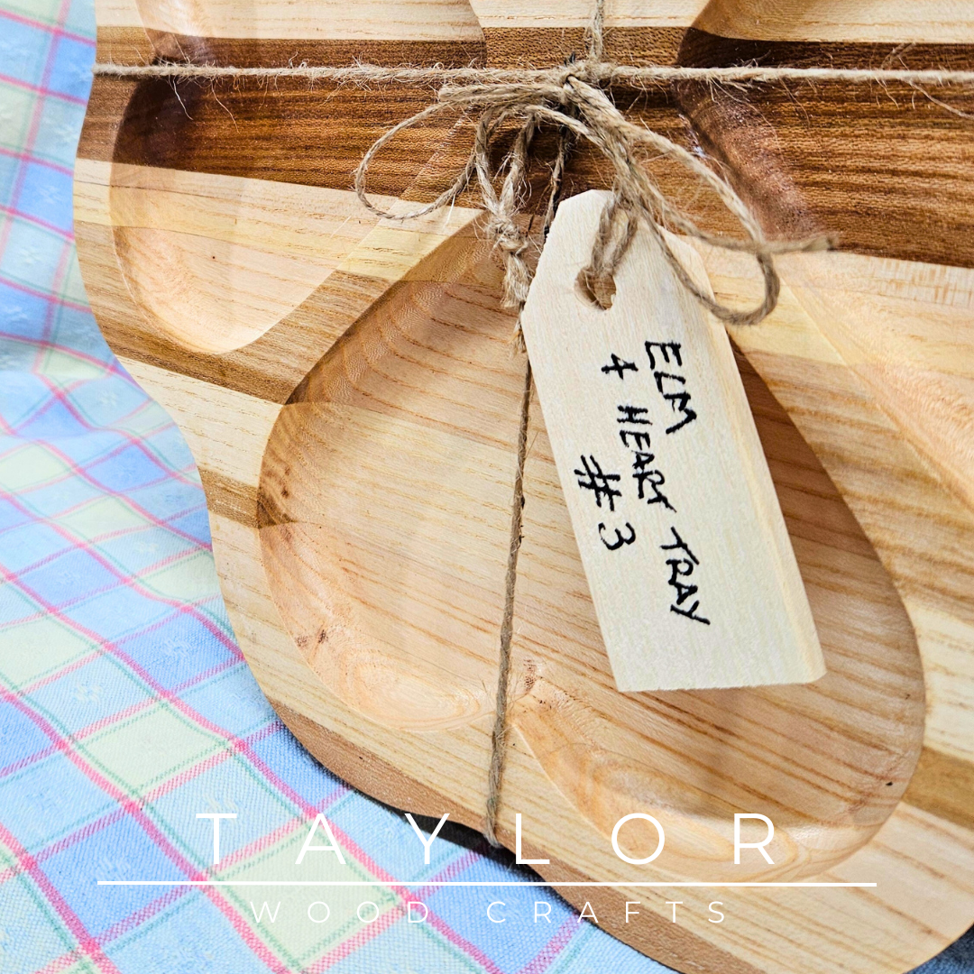 Discover our handcrafted elm wood serving tray, featuring a distinctive four-heart design. Perfect for serving treats, displaying decor, or as a thoughtful gift.