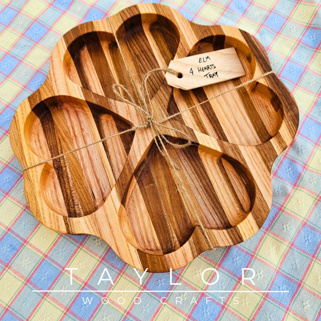 Discover our handcrafted elm wood serving tray, featuring a distinctive four-heart design. Perfect for serving treats, displaying decor, or as a thoughtful gift.