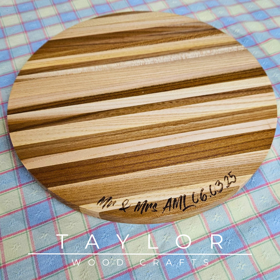 Handcrafted circular wedding cake board with personalized laser engraving, offering elegant support and a custom touch for your special day.