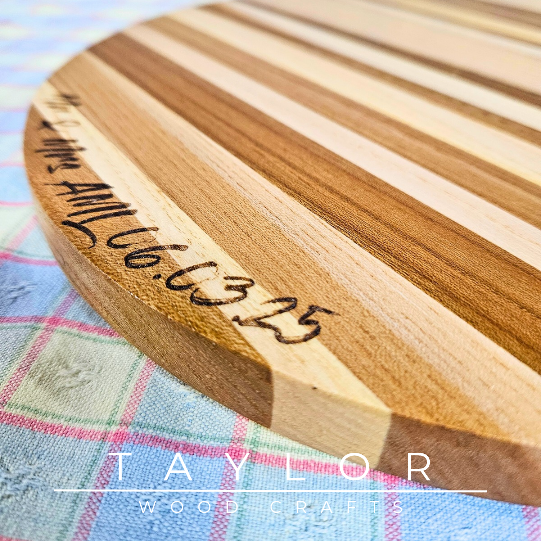 Handcrafted circular wedding cake board with personalized laser engraving, offering elegant support and a custom touch for your special day.