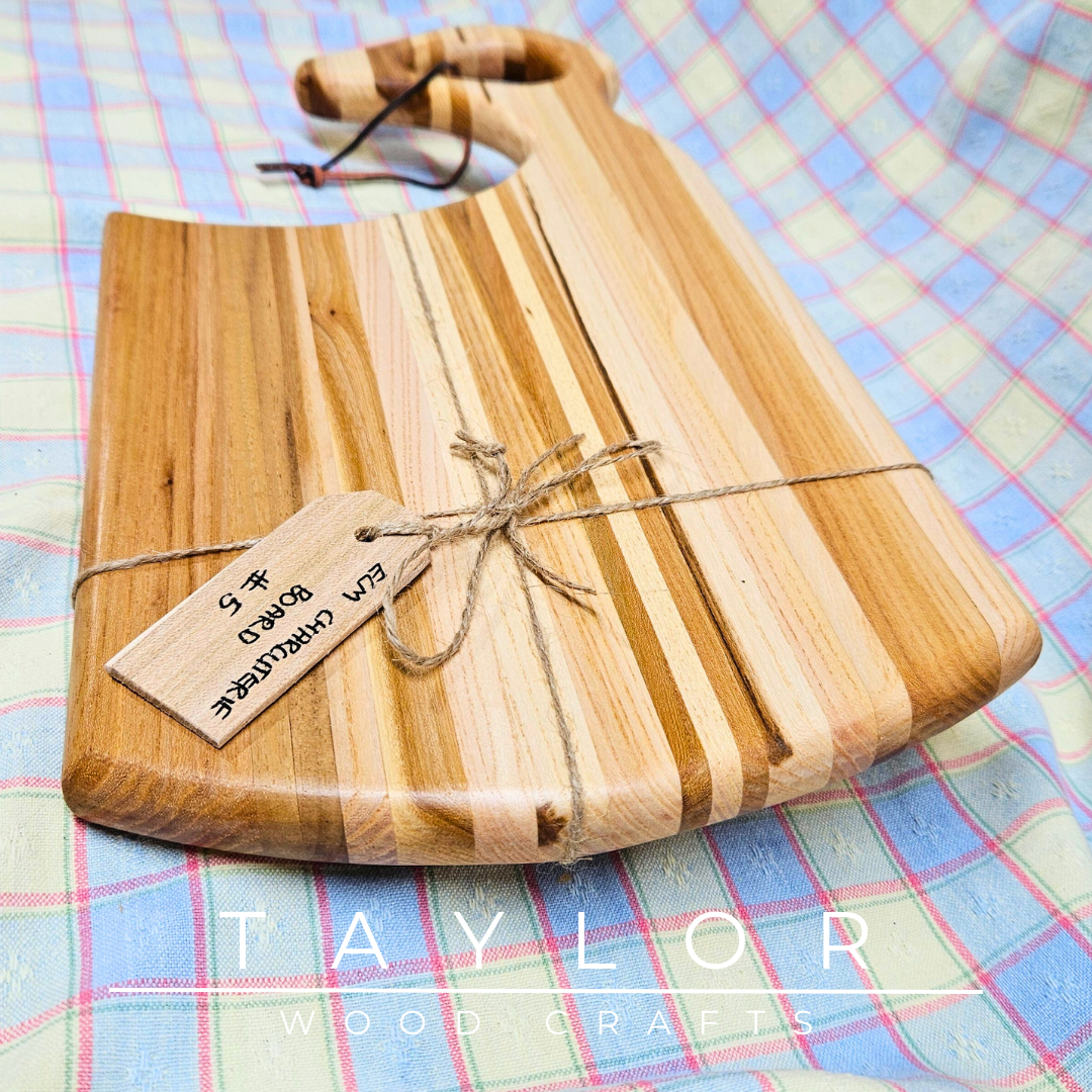 Handcrafted charcuterie board with a swan neck handle and leather string, combining elegance and functionality for serving in style.