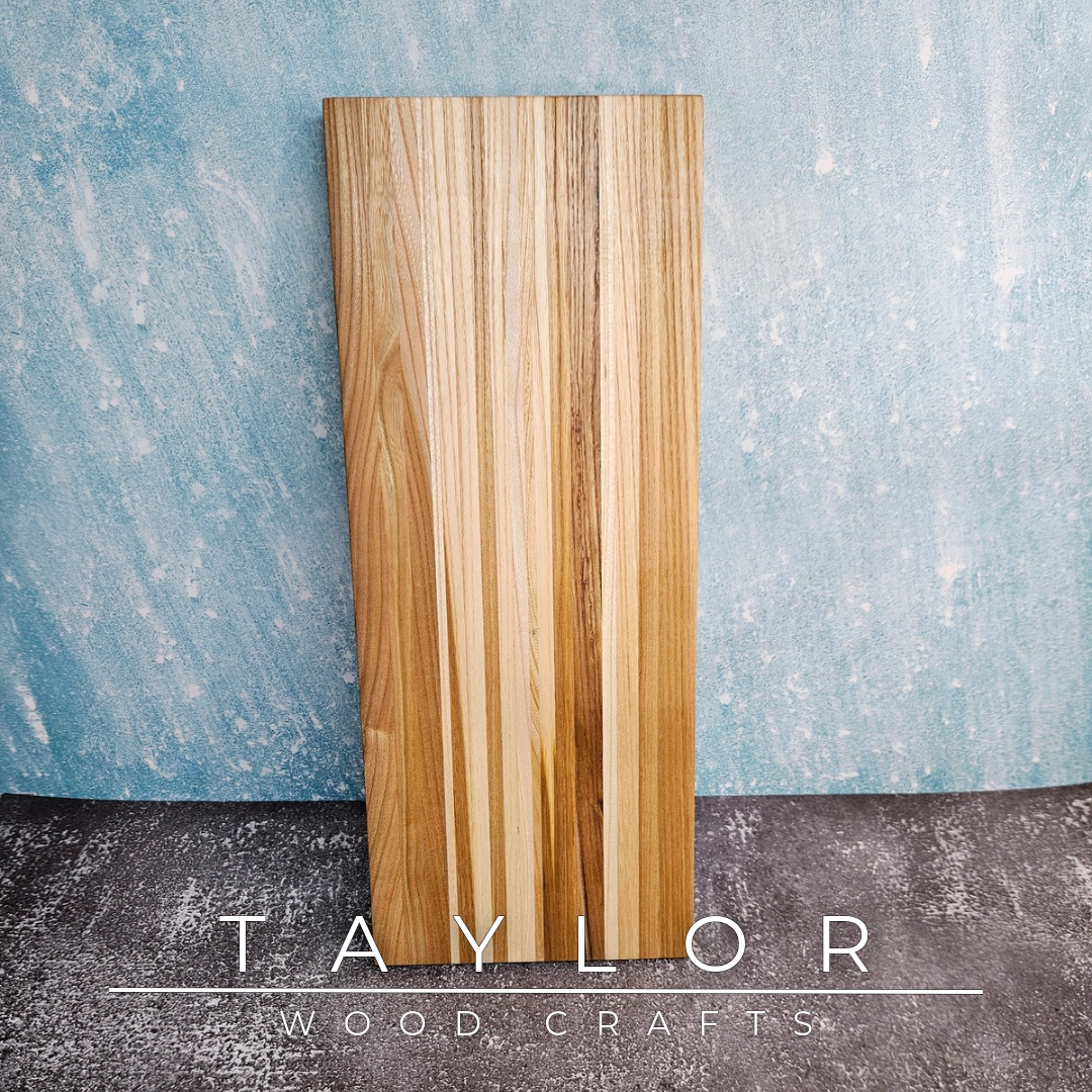 Handcrafted charcuterie and cheese board made from Irish-sourced elm, handcrafted in Northern Ireland by Taylor Wood Crafts.