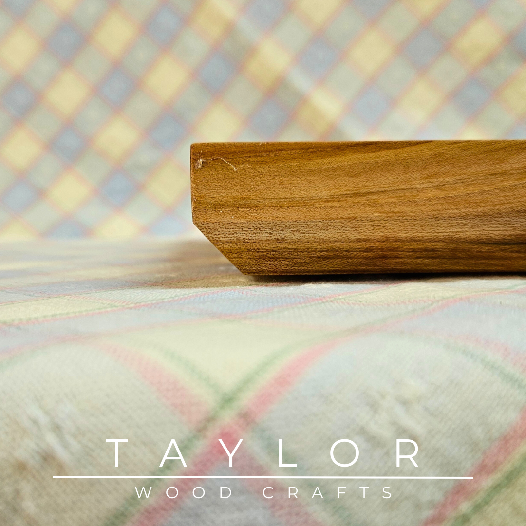 Handmade hardwood charcuterie board, crafted from locally sourced wood and finished with food-safe oils.