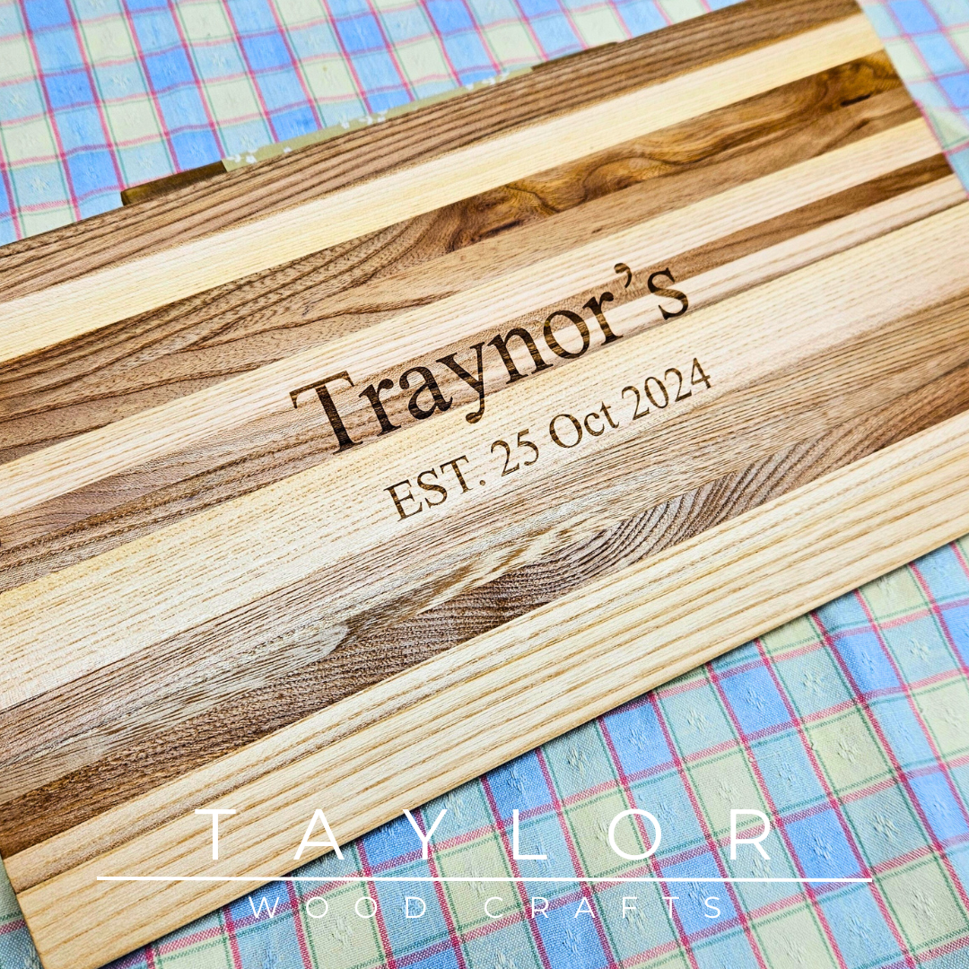 Handcrafted charcuterie board with personalized laser engraving, adding a custom touch and elegance for serving appetizers in style.