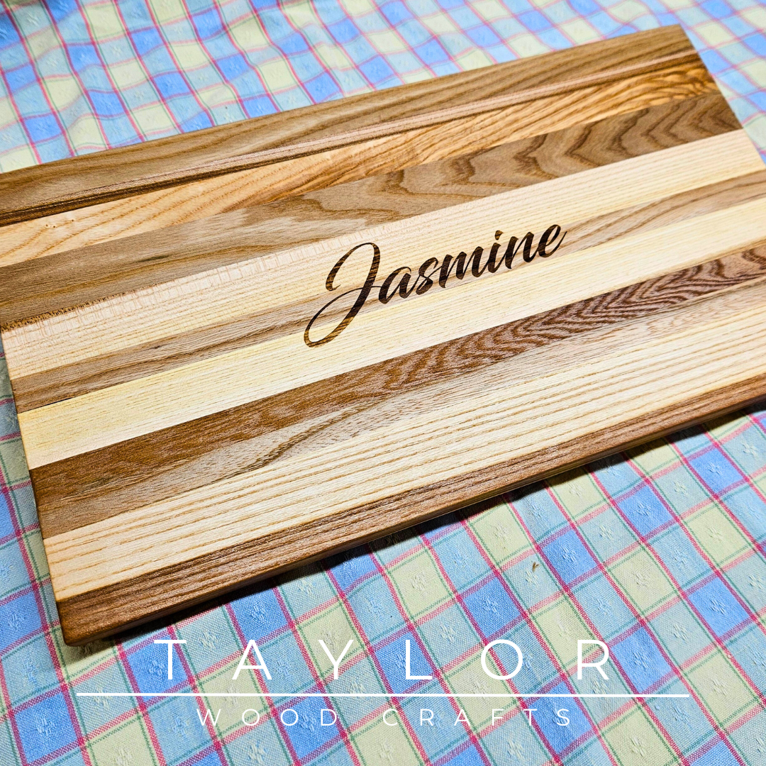 Handcrafted charcuterie board with personalized laser engraving, adding a custom touch and elegance for serving appetizers in style.