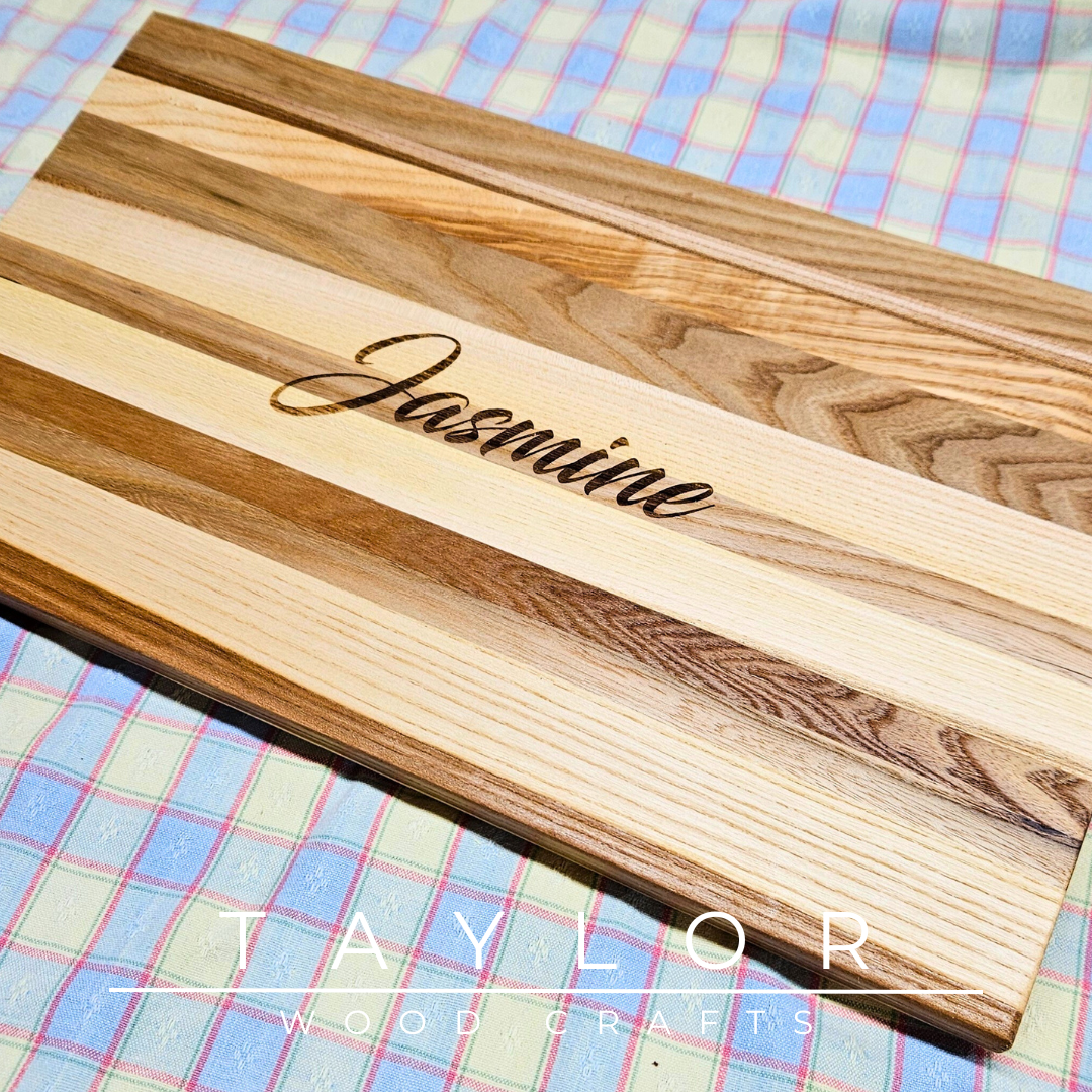 Handcrafted charcuterie board with personalized laser engraving, adding a custom touch and elegance for serving appetizers in style.