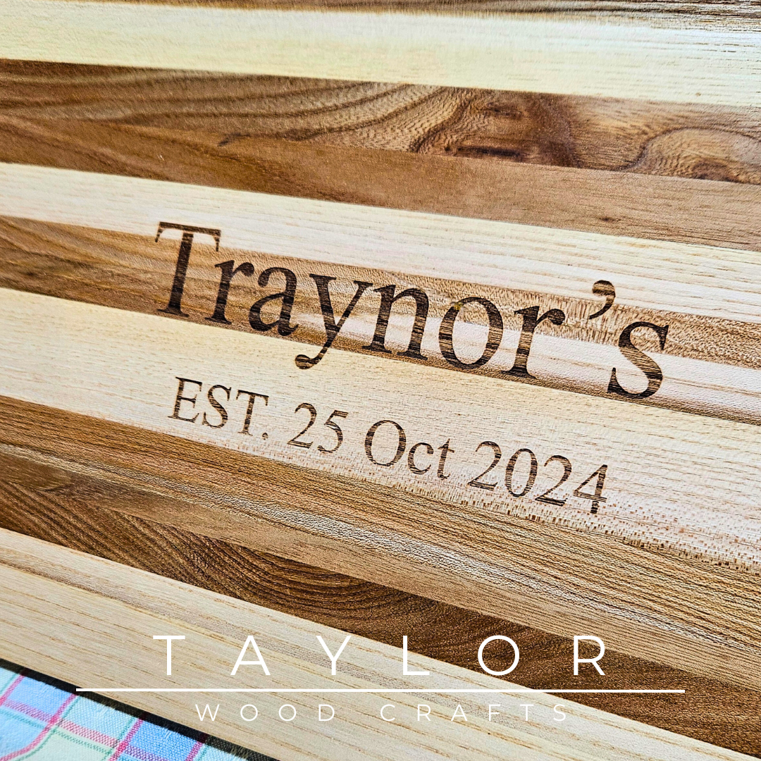 Handcrafted charcuterie board with personalized laser engraving, adding a custom touch and elegance for serving appetizers in style.