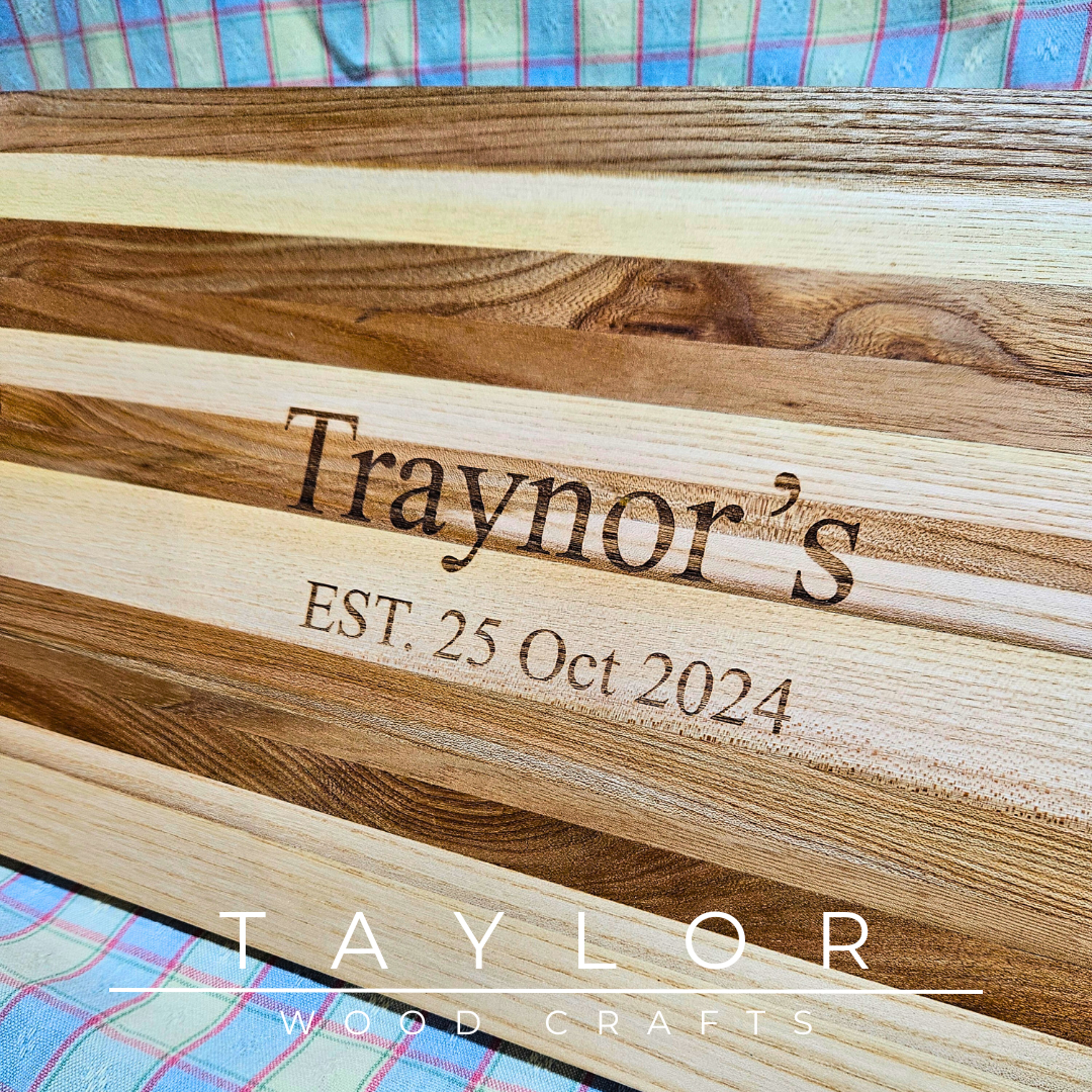 Handcrafted charcuterie board with personalized laser engraving, adding a custom touch and elegance for serving appetizers in style.