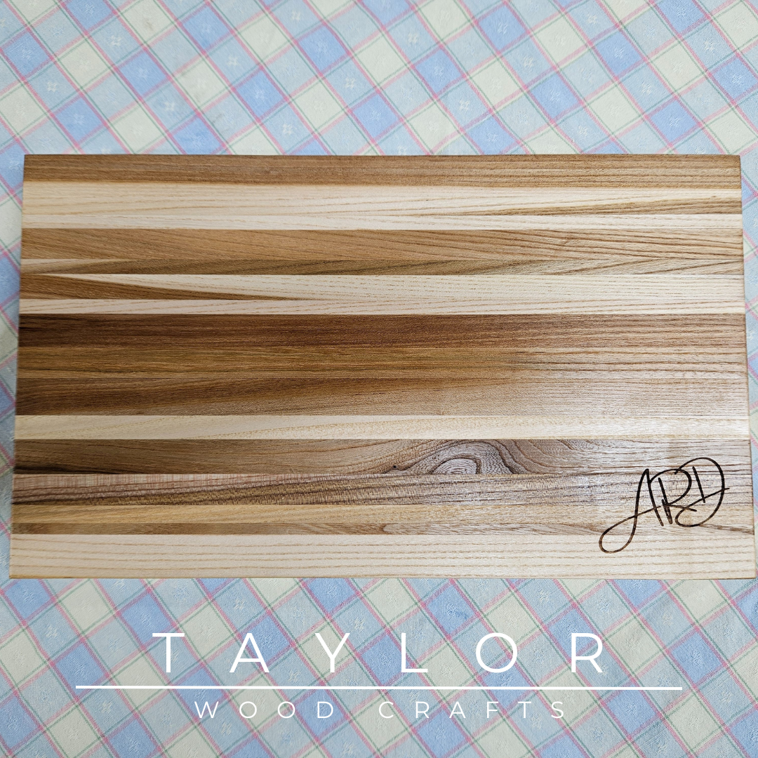 Handcrafted charcuterie board with personalized laser engraving, adding a custom touch and elegance for serving appetizers in style.