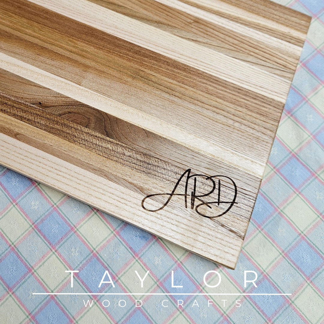 Handcrafted charcuterie board with personalized laser engraving, adding a custom touch and elegance for serving appetizers in style.