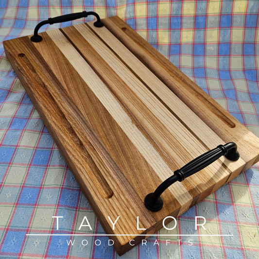 Handcrafted charcuterie board with handles, made from elm wood, offering elegance and functionality for serving your favorite appetizers.