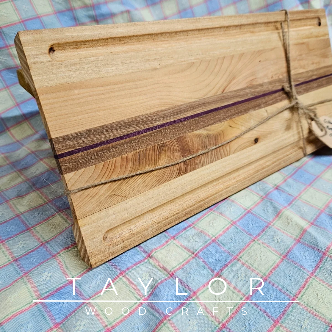 Handcrafted chopping board made from walnut, purple heart, and cedar wood, offering durability and unique style for your kitchen.