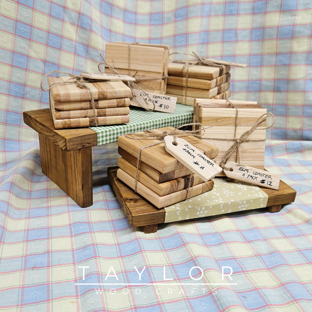 Handcrafted elm wood four coaster pack, offering natural elegance and durability to protect your surfaces in style.