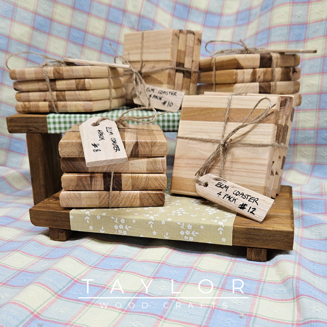 Handcrafted elm wood four coaster pack, offering natural elegance and durability to protect your surfaces in style.