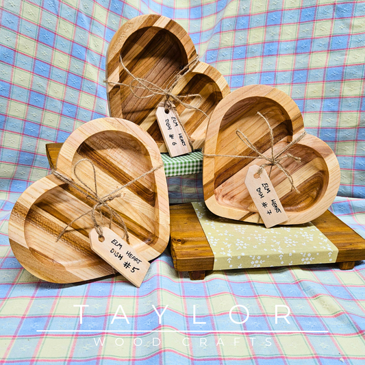 Handcrafted heart-shaped dish made from elm wood, adding a touch of natural elegance for serving treats or displaying decor.