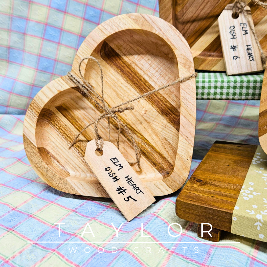 Handcrafted heart-shaped dish made from elm wood, adding a touch of natural elegance for serving treats or displaying decor.