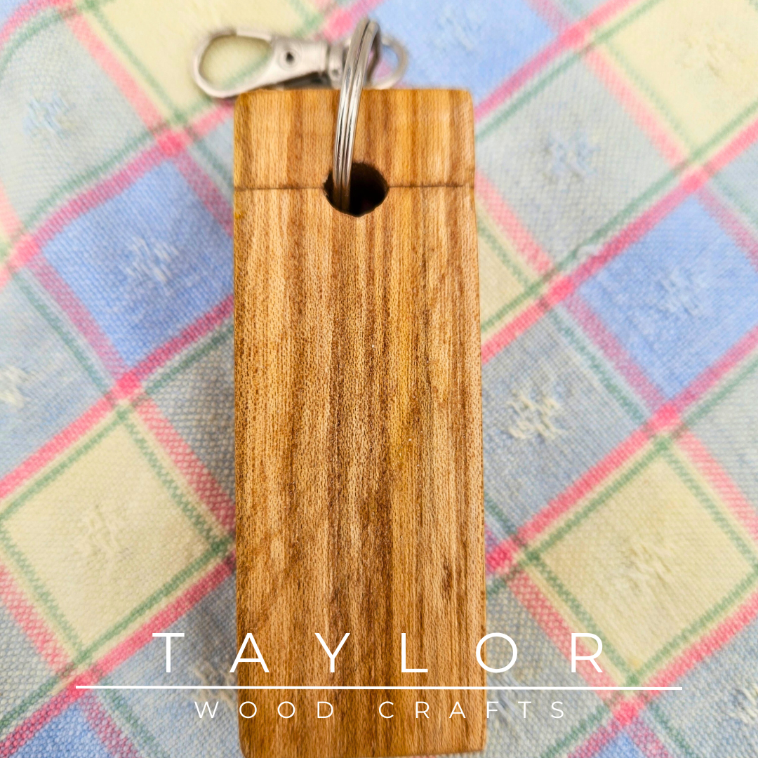 Handcrafted keyring made with elm wood, offering natural elegance and durability to keep your keys organized in style.