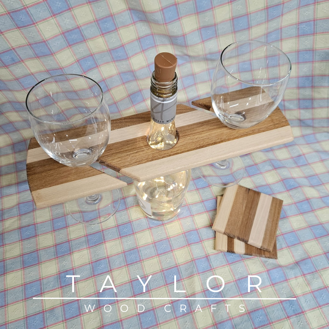 Handcrafted elm wood wine caddy, carrying one bottle and two glasses, with two matching coasters, available in four unique tinted versions.