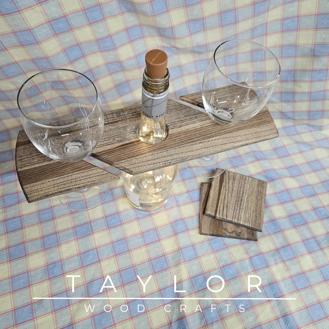 Handcrafted elm wood wine caddy, carrying one bottle and two glasses, with two matching coasters, available in four unique tinted versions.