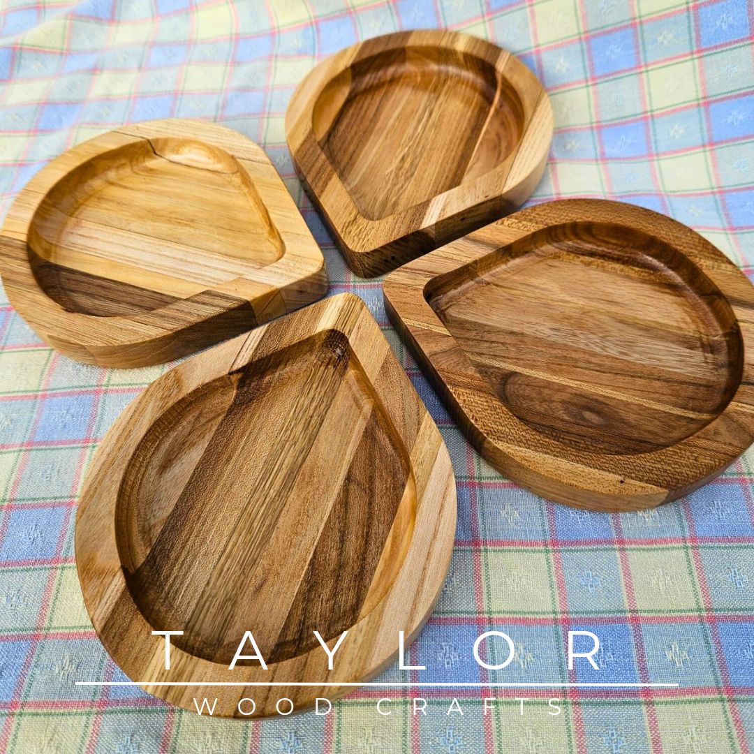 Handcrafted set of 4 leaf dishes made from elm wood, combining natural beauty and durability for serving in style.