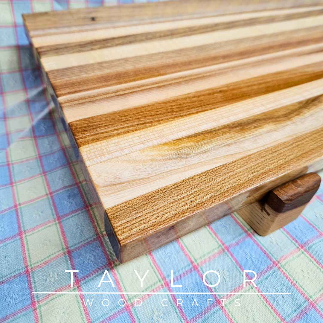 Handcrafted large serving board with a smooth epoxy resin coating, combining durability and style for serving food in elegance.