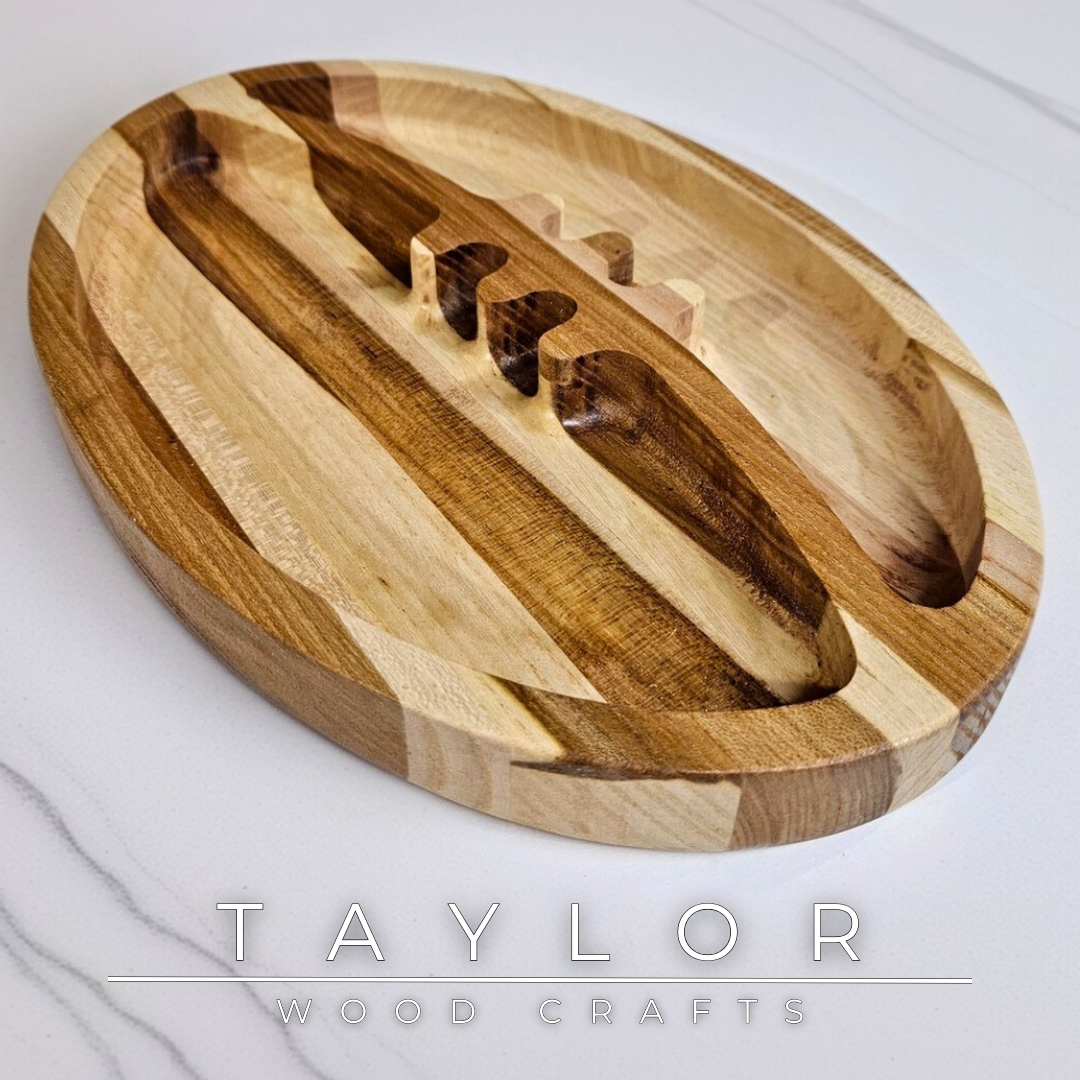Discover our handcrafted wooden serving dish shaped like a rugby ball, blending natural wood beauty with a playful design. Perfect for serving snacks, displaying decor, or as a thoughtful gift for rugby enthusiasts.