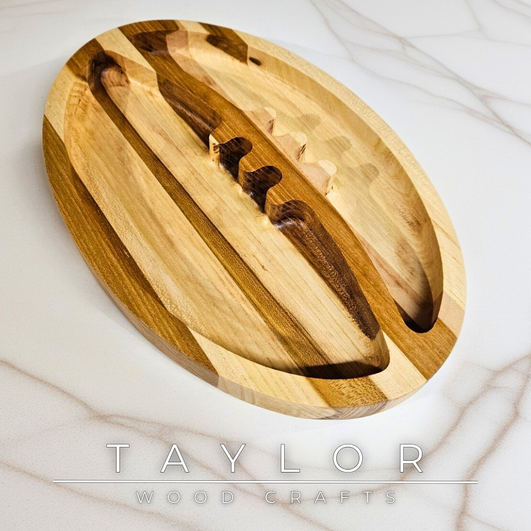 Discover our handcrafted wooden serving dish shaped like a rugby ball, blending natural wood beauty with a playful design. Perfect for serving snacks, displaying decor, or as a thoughtful gift for rugby enthusiasts.