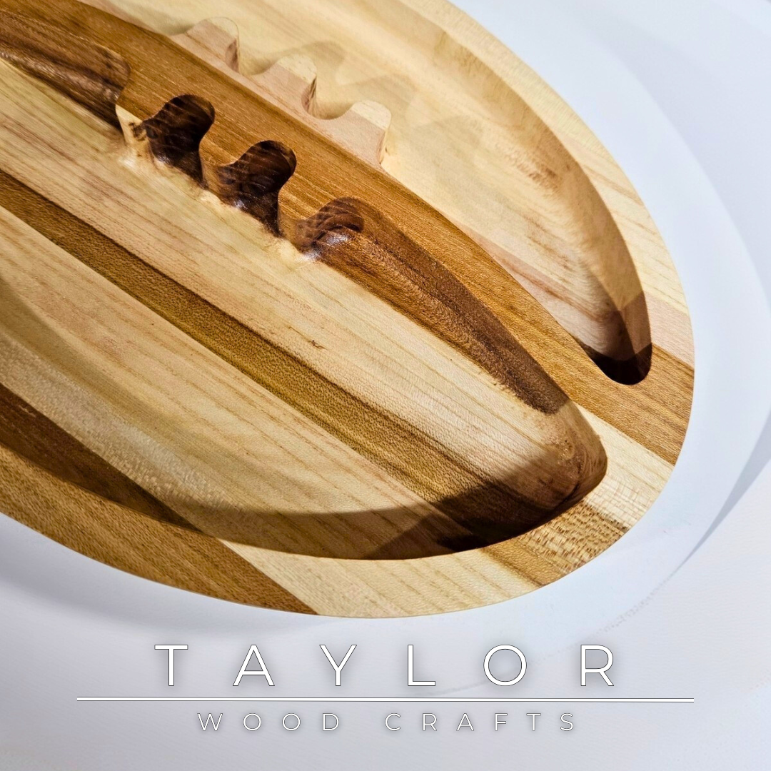 Discover our handcrafted wooden serving dish shaped like a rugby ball, blending natural wood beauty with a playful design. Perfect for serving snacks, displaying decor, or as a thoughtful gift for rugby enthusiasts.