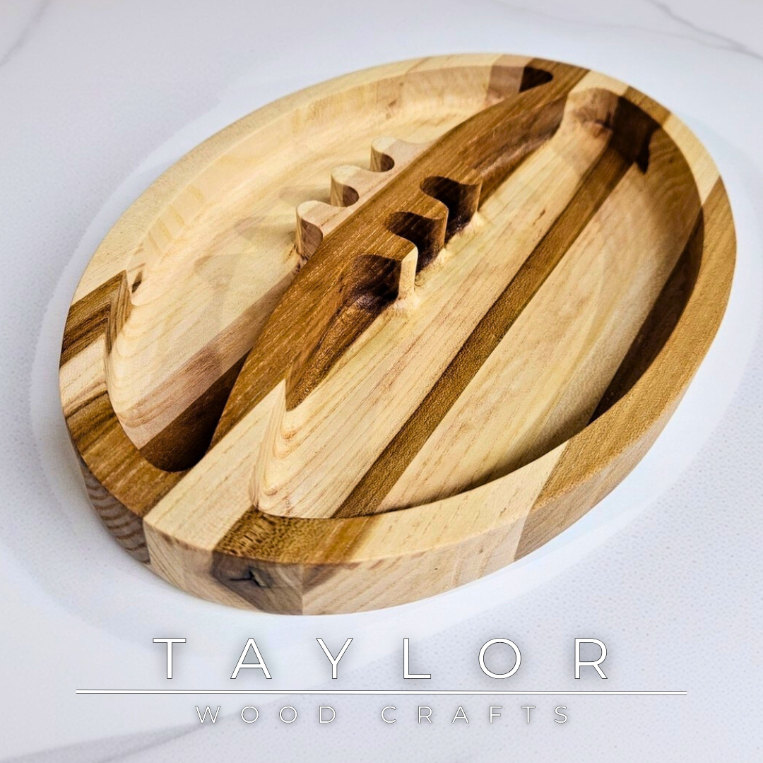 Discover our handcrafted wooden serving dish shaped like a rugby ball, blending natural wood beauty with a playful design. Perfect for serving snacks, displaying decor, or as a thoughtful gift for rugby enthusiasts.