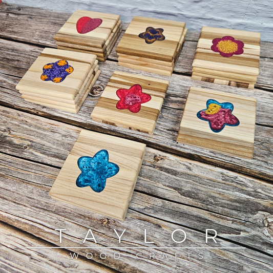 Taylor Wood Crafts. Handcrafted elm wood coasters with vibrant epoxy resin inserts, combining durability, style, and a pop of color to protect your surfaces.