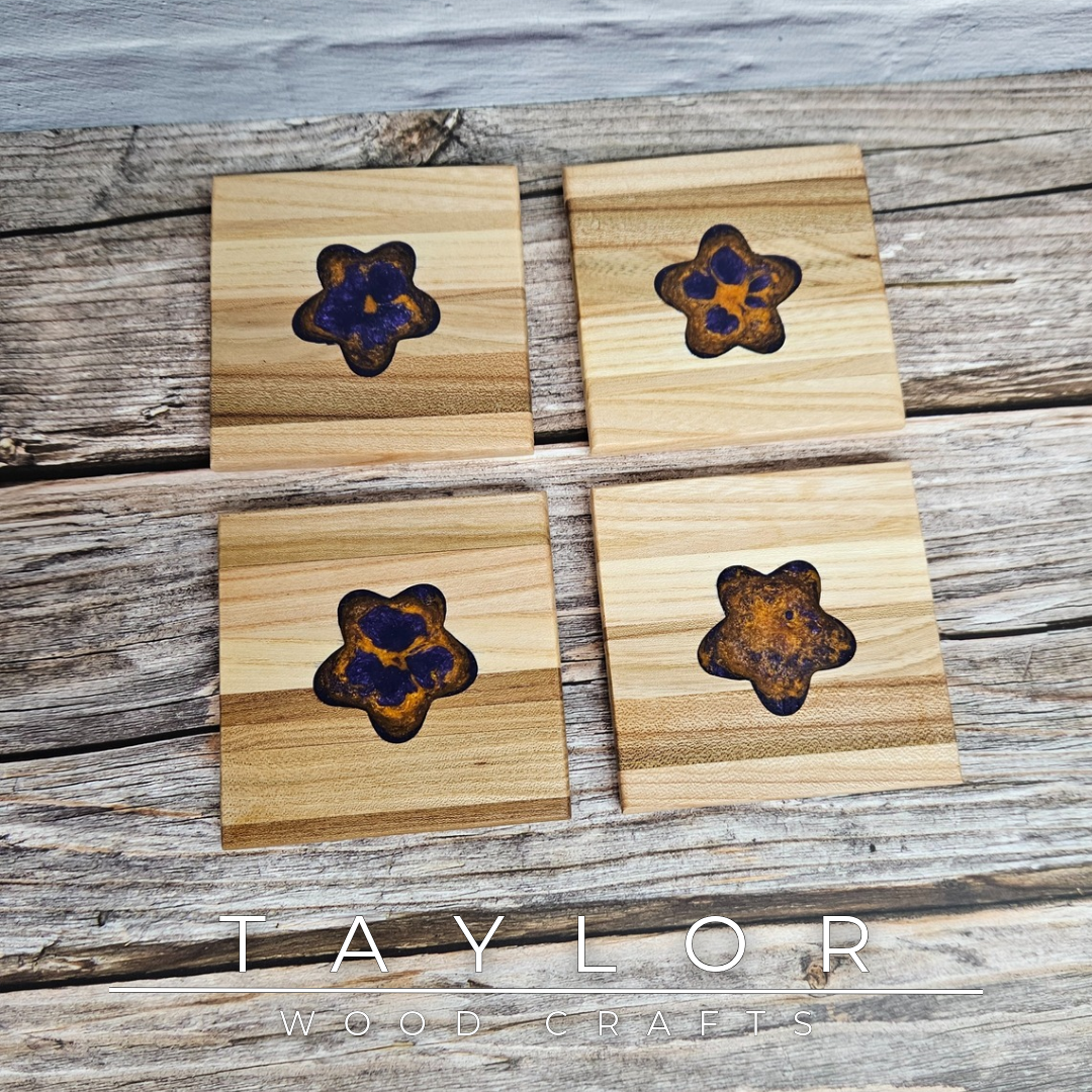 Taylor Wood Crafts. Handcrafted elm wood coasters with vibrant epoxy resin inserts, combining durability, style, and a pop of color to protect your surfaces.