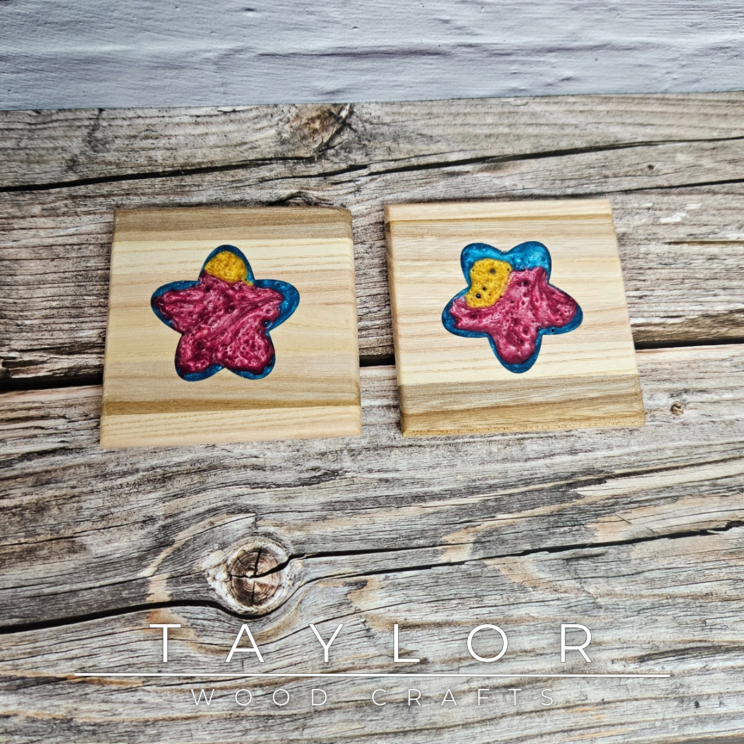 Taylor Wood Crafts. Handcrafted elm wood coasters with vibrant epoxy resin inserts, combining durability, style, and a pop of color to protect your surfaces.