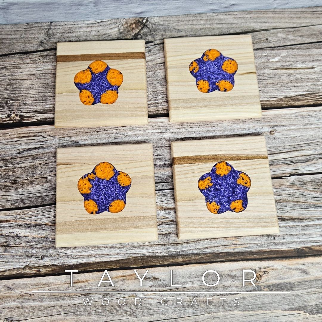 Taylor Wood Crafts. Handcrafted elm wood coasters with vibrant epoxy resin inserts, combining durability, style, and a pop of color to protect your surfaces.