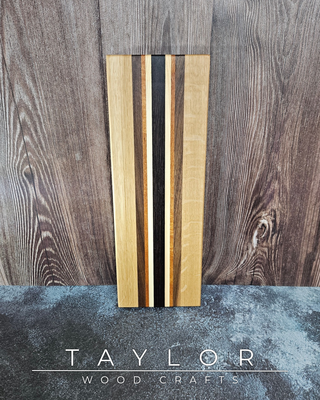 Wooden strips with different finishes on a wooden background, featuring the brand 'Taylor Wood Craft'.