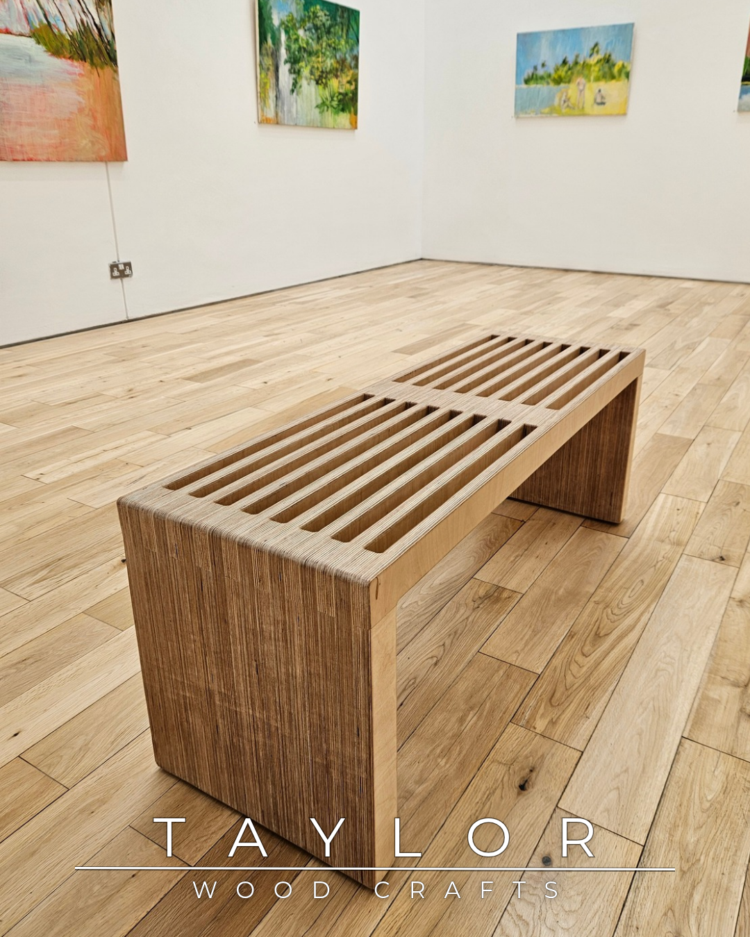 Wooden bench on a wooden floor with 'Taylor Wood Crafts' branding.