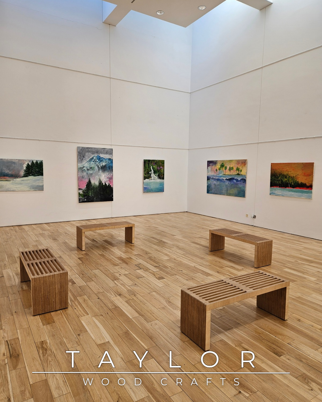 Modern room with wooden benches and wall art, featuring the Taylor Wood Crafts logo.