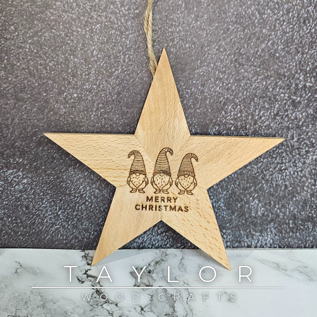 Handcrafted wooden Christmas stars by Taylor Wood Crafts, fully customisable with laser-engraved names or festive graphics.
