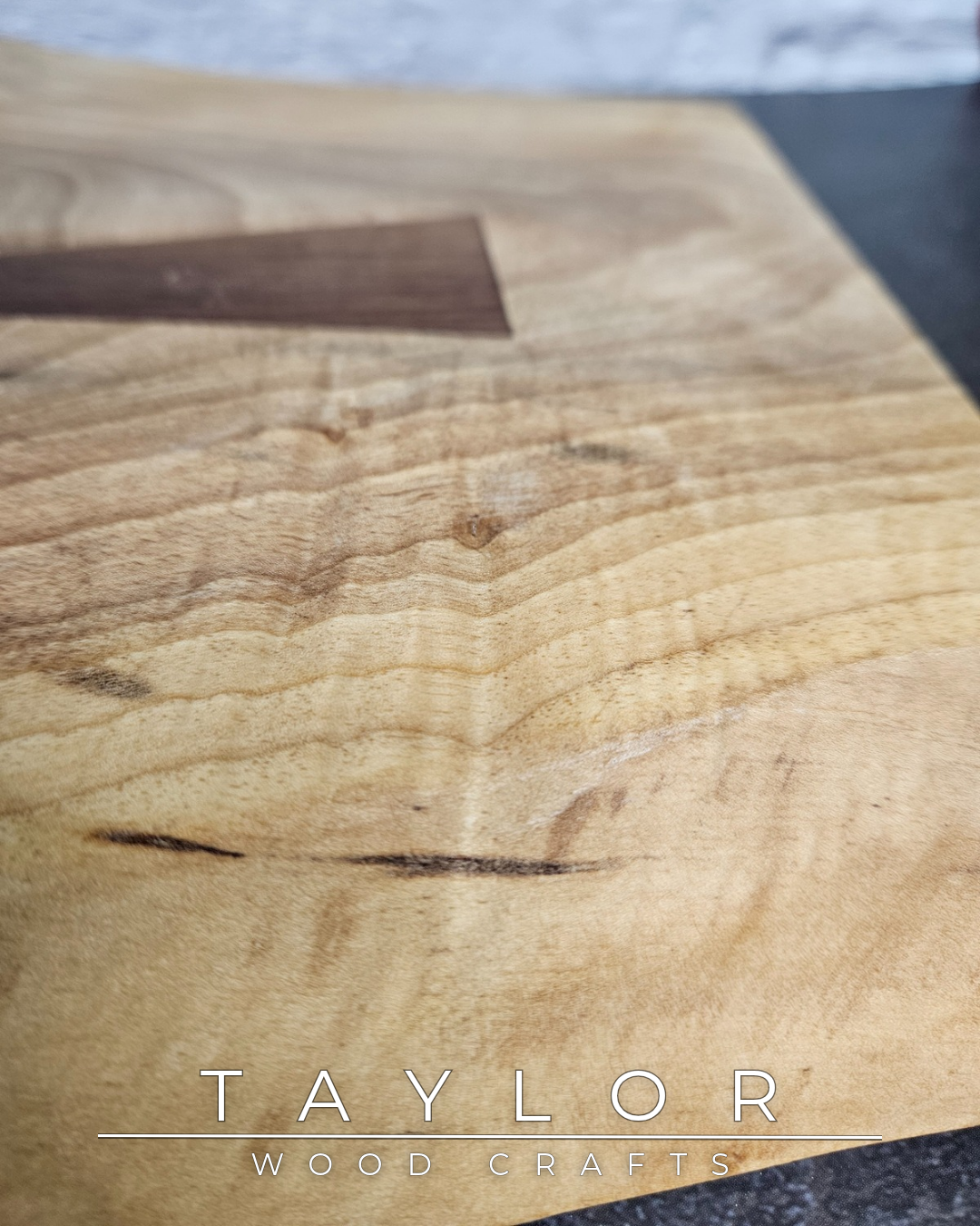 Handcrafted live edge walnut chopping block by Taylor Wood Crafts. Made from premium solid walnut, each board is one of a kind — perfect for cooking, serving, or display.