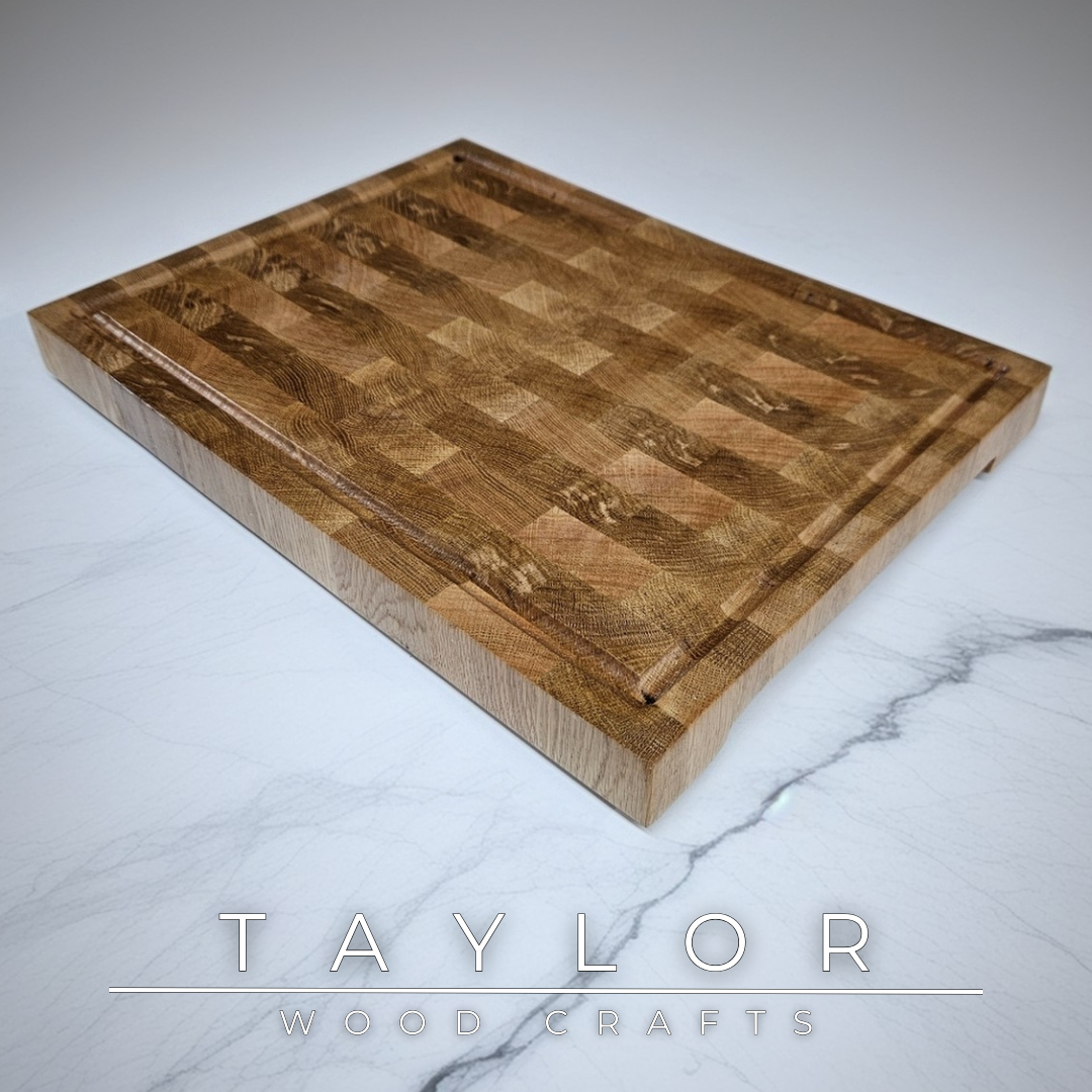 Oak butcher block Taylor Wood Crafts Handmade with rich grain patterns, offering a durable and timeless surface for kitchen prep and serving.