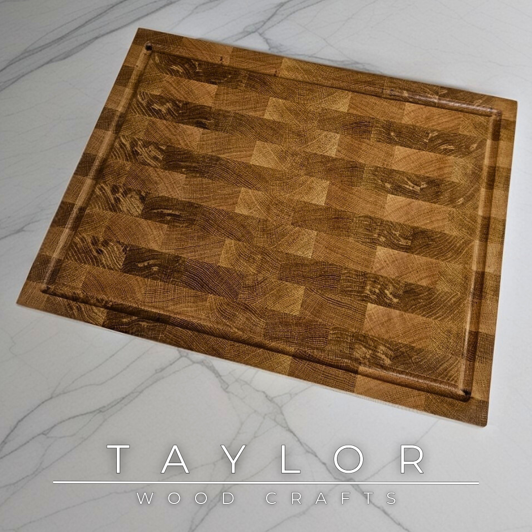 Oak butcher block Taylor Wood Crafts Handmade with rich grain patterns, offering a durable and timeless surface for kitchen prep and serving.