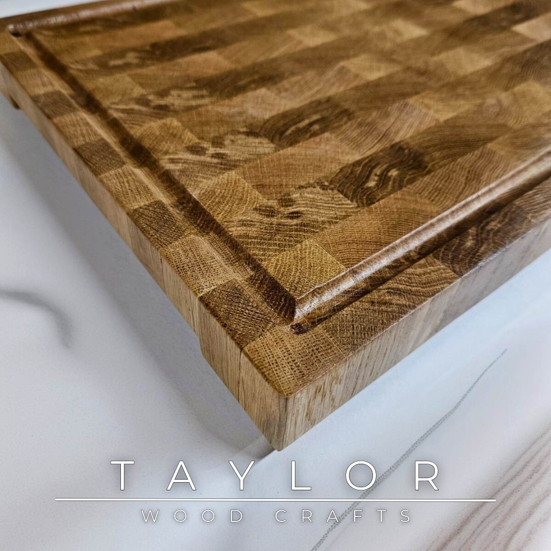Oak butcher block Taylor Wood Crafts Handmade with rich grain patterns, offering a durable and timeless surface for kitchen prep and serving.