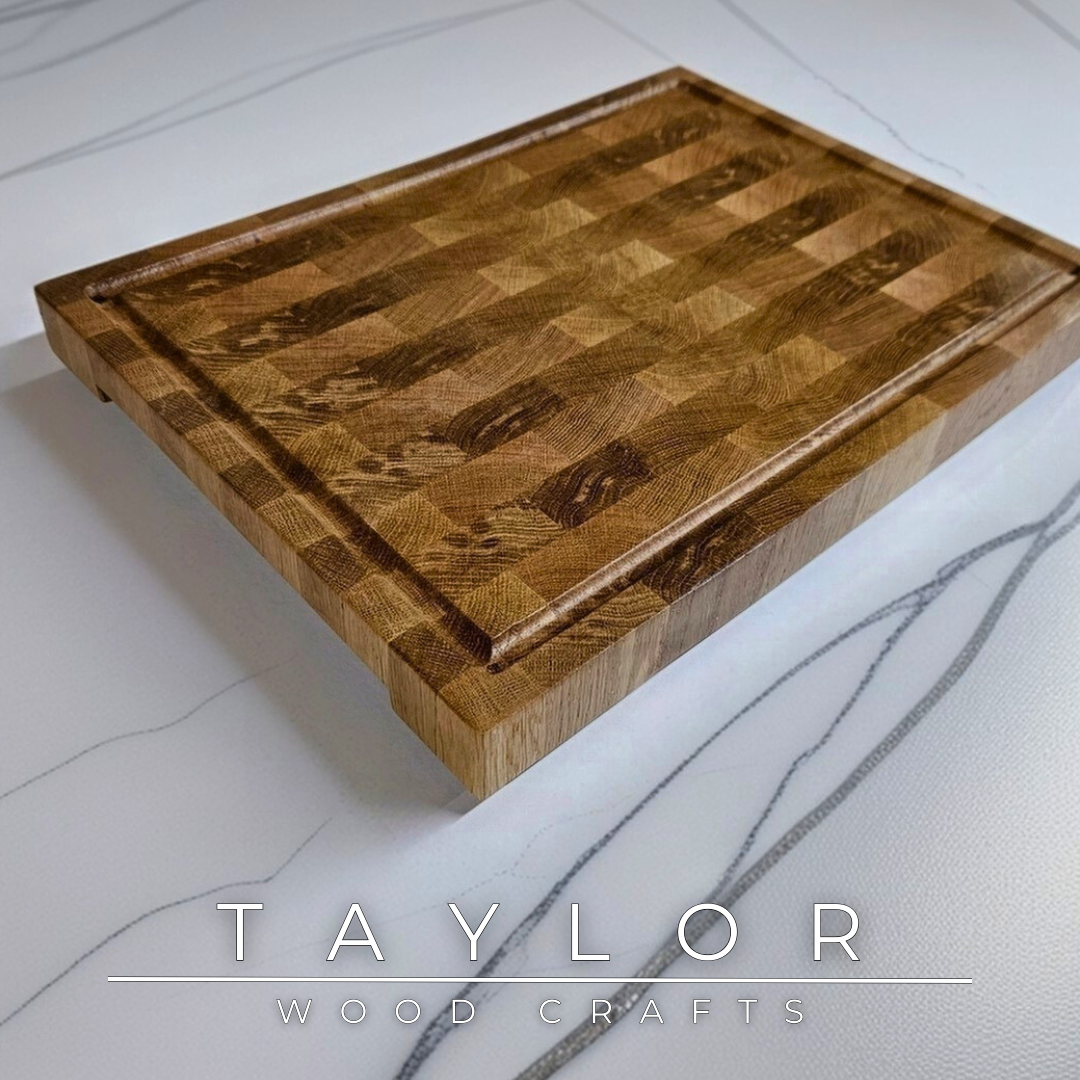 Oak butcher block Taylor Wood Crafts Handmade with rich grain patterns, offering a durable and timeless surface for kitchen prep and serving.