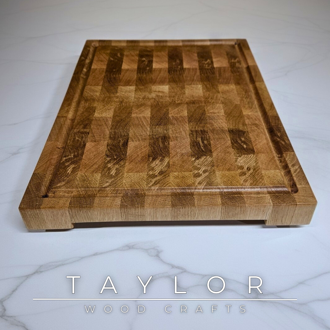Oak butcher block Taylor Wood Crafts Handmade with rich grain patterns, offering a durable and timeless surface for kitchen prep and serving.