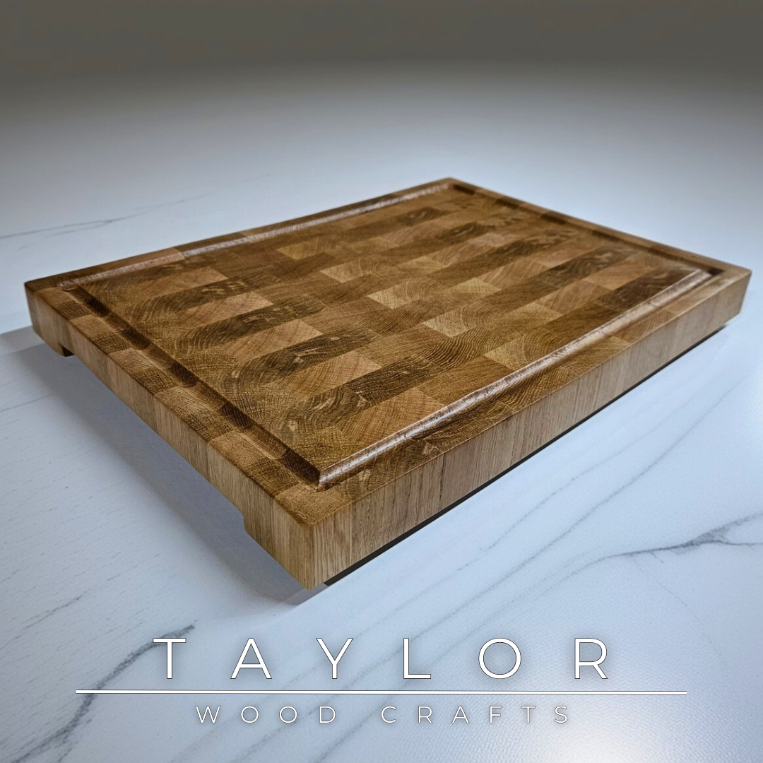 Oak butcher block Taylor Wood Crafts Handmade with rich grain patterns, offering a durable and timeless surface for kitchen prep and serving.