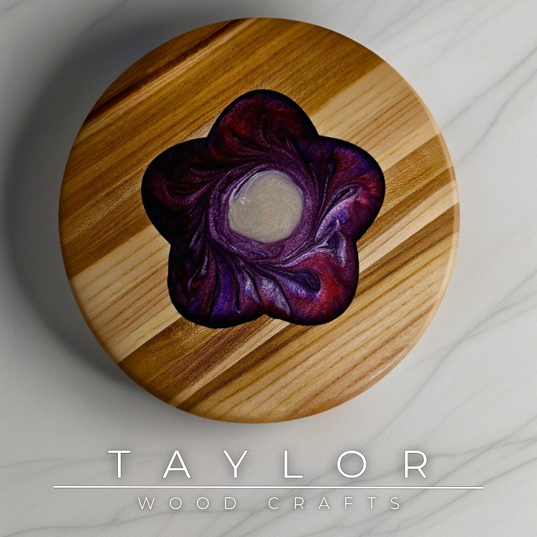 This handcrafted trivet combines the natural warmth of wood with a striking epoxy resin insert, creating a functional piece with artistic flair. Heat-resistant and stylish, it’s perfect for protecting your surfaces while adding a unique touch to your kitchen or table.