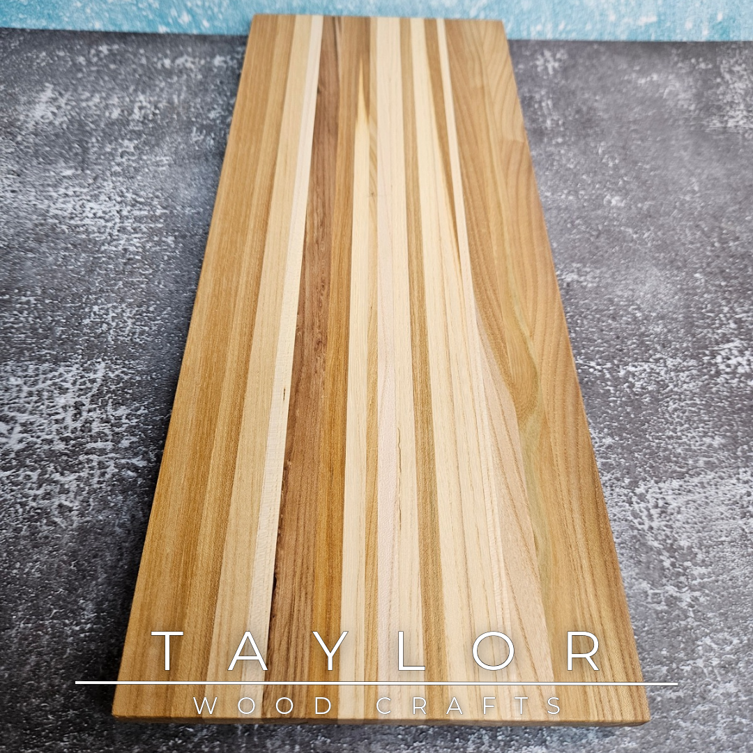 Handcrafted charcuterie and cheese board made from Irish-sourced elm, handcrafted in Northern Ireland by Taylor Wood Crafts.