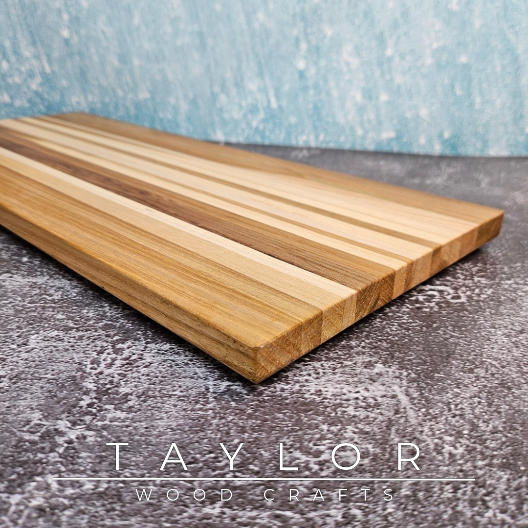 Handcrafted charcuterie and cheese board made from Irish-sourced elm, handcrafted in Northern Ireland by Taylor Wood Crafts.