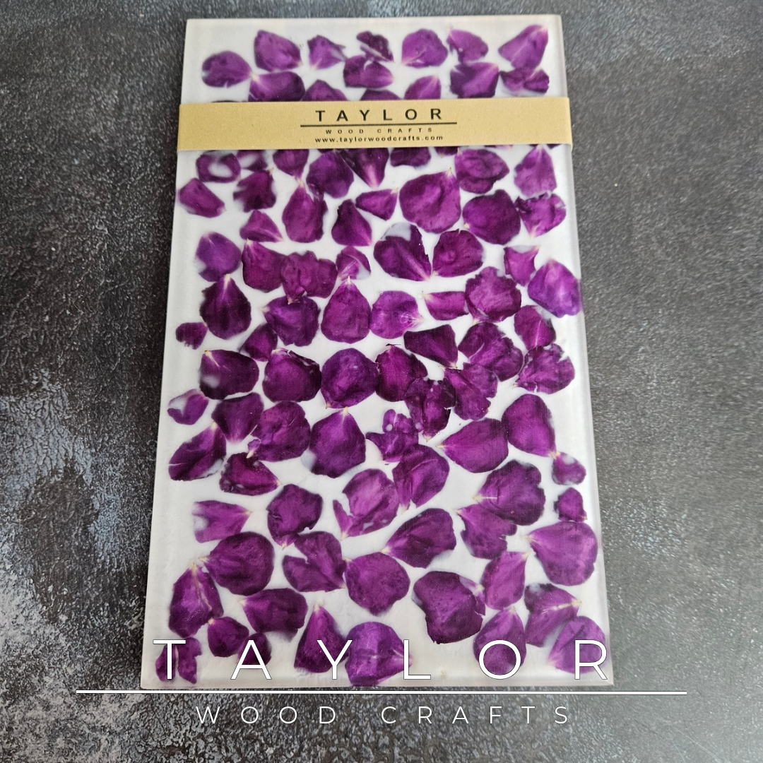 Handmade Elm charcuterie board with natural Elm on one side and real red rose petals encased in clear resin on the other, designed for serving, chopping or decorative display.
